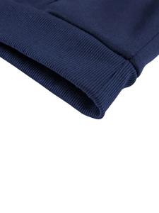 Ensemble de survêtement athleisure évasé avec pantalon fuselé taille haute et sweat à capuche court pour un look élégant et sportif. - Product Image 4