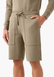 Unique oversized "<b>patch</b>-style" front pockets with visible topstitching, offering a workwear-inspired aesthetic on a soft knit - Product Image 3