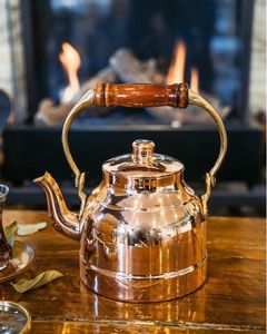 Bouilloire à thé classique en cuivre, d'inspiration vintage, pour les amateurs de thé à la maison, élégante, avec une construction thermiquement efficace pour un service optimal. - Product Image 1