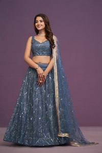 Magnifique Lehenga Choli de mariage bleu avec des détails en résille - Product Image 1