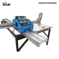 Table de découpe plasma CNC 2000mmx4000mm avec dépoussiéreur industriel pour un environnement de coupe propre en atelier