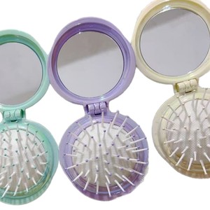 Peigne à coussin d'air pliable avec miroir, peigne à coussin d'air portable et esthétique, peigne de massage - Product Image 1