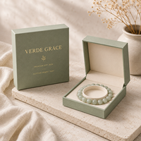 Boîte cadeau magnétique haut de gamme en carton rigide écologique avec couvercle et base en mousse, texture fine, logo en feuille d'or, personnalisable OEM pour bijoux