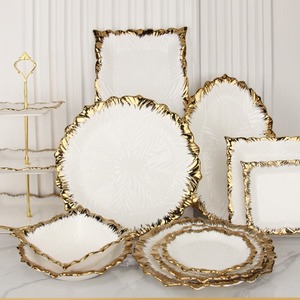 Glossy pristine white ceramic <b>dinnerware</b> with a rich textured handcrafted Gold rim high kiln temperature durable fade-resistant - Product Image 1