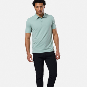 เสื้อโปโลผู้ชายสีเขียวอ่อนแขนสั้นทรงเข้ารูปลำลองสีทึบผ้าถัก - Product Image 1