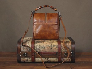 กระเป๋าถือหนังแท้พรีเมียมสำหรับผู้หญิง – กระเป๋าสะพายสไตล์วินเทจโบโฮพร้อมพู่ห้อยและดีเทลประดับหมุด - Product Image 3