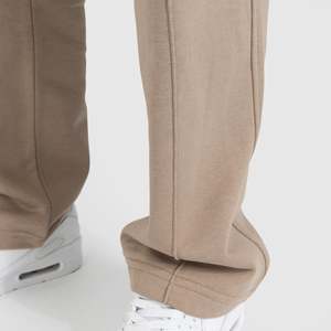 Wholesale Custom Design and Style Joggers Pants Custom Embroidered Logo Elastic Waist <b>Plain</b> Casual Pleated Joggers Pants - Product Image 4