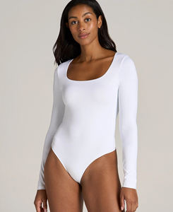 Combinaison de yoga moulante à manches longues et col rond pour femme, avec manches bouffantes, taille haute, respirante, style streetwear, qualité supérieure, vente en gros - Product Image 1