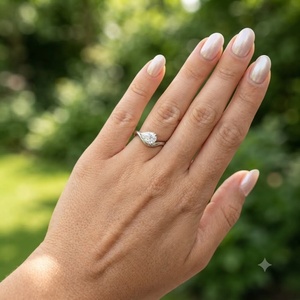 Bague de fiançailles et de mariage personnalisée en or rose 14 carats avec diamant taille poire certifié IGI 1,25 carat, style solitaire croisé est-ouest, pour le petit doigt - Product Image 3
