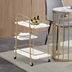 Chariot de service moderne en métal doré avec étagères en marbre blanc, design durable pour les fêtes et la restauration - Product Image 5