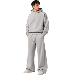 Oferta caliente: Conjuntos de sudaderas con capucha lisas de felpa francesa gris de 450 GSM, personalizables, de talla grande, al por mayor para hombre, con pantalones de chándal de ajuste holgado. - Product Image 1