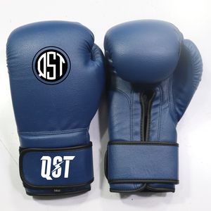 ถุงมือฝึกซ้อมมวยหนังวัวแท้สีน้ำเงิน QST Professional พร้อมที่รัดข้อมือแบบกว้าง ปิดด้วยแถบตีนตุ๊กแก และช่วยดูดซับแรงกระแทก - Product Image 1