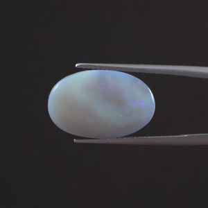Opale naturelle blanche en vrac, 6,05 carats, taille ovale 19,5x11mm, certifiée IGI, taillée à la main, polie, avec traitement de cirage/lustrage léger - Product Image 1