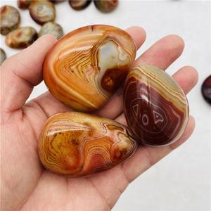 Venta al por mayor de piedras de ágata sardónica natural pulida de alta calidad, piedras de cristal de ágata roja con bandas para joyería femenina. - Product Image 1
