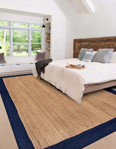 Alfombra de yute natural con borde azul marino, alfombra tejida a mano para sala de estar y dormitorio - Product Image 1
