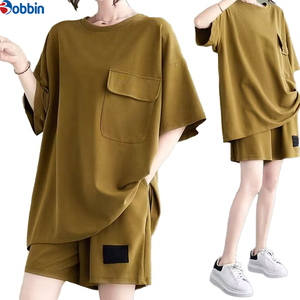 Conjunto de 2 piezas casual de moda, top holgado con cuello redondo y bolsillos, y shorts anchos de verano para mujer, tallas grandes. - Product Image 1
