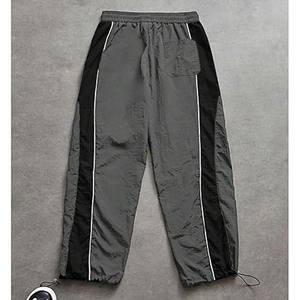กางเกงวอร์มผู้ชายทรงโอเวอร์ไซส์สุดเทรนดี้ รับสั่งทำปักโลโก้ พิมพ์ลาย  ผ้าไนลอน ผลิตโดยโรงงาน OEM - Product Image 6