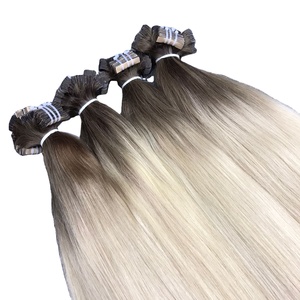Venta al por mayor 100% Extensiones de Cabello Virgen Natural Liso Alta Calidad Gran Stock Vietnamita Cabello Crudo Color Claro CINTA - Product Image 1