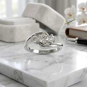 1.00CTW Three Stone Round Solitaire Prong set Diamond Ring - Product Image 1