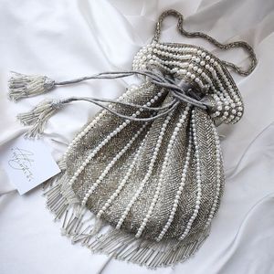 Bolso Potli de Algodón Hecho a Mano con Bordado de Seda y Cordón de Perlas en Gris Plateado para Bodas de Lujo - Product Image 1
