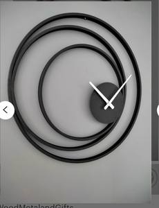 Horloge murale de luxe dorée effet soleil, design artistique en métal rayonnant, pièce décorative moderne et audacieuse pour salon - Product Image 6