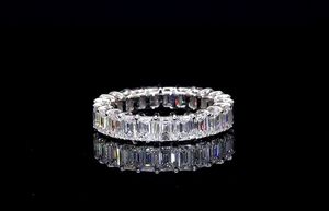 Emerald cut <b>diamond</b> eternity band <b>ring</b> with endless brilliance for wedding anniversary stacking and luxury fine jewelry - Product Image 1