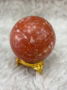 Sphère de calcite orange aux couleurs ambre vibrantes, profondeur translucide, forme lisse, éclat chaud et charme minéral distinctif - Product Image 4
