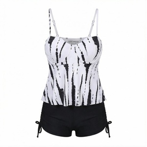 Ensemble de yoga 2 pièces imprimé papillon bleu avec finition dorée, body à col en V profond et jupe portefeuille longueur genou - Product Image 1