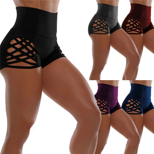 Shorts de yoga taille haute évidés pour femme, couleur unie, sans couture, compression, extensibles dans les quatre sens, en Spandex et Nylon - Product Image 1