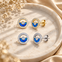 Boucles d'oreilles clous en argent 925 avec opale bleue en arc inférieur et centre transparent, finition or ou argent