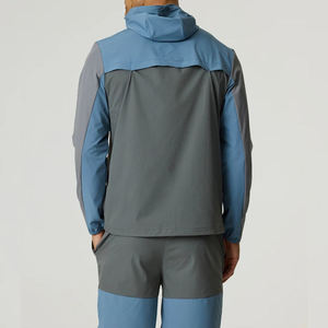 Veste de survêtement à capuche pour homme avec blocs de couleur et poches latérales, séchage rapide, légère, sportive, pour le printemps, coupe classique - Product Image 1