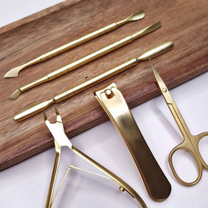 Pro Advanced Nail Tools Kit Pinces à cuticules dorées Manucure professionnelle Utiliser des poussoirs à cuticules et des ciseaux pour ongles - Product Image 1