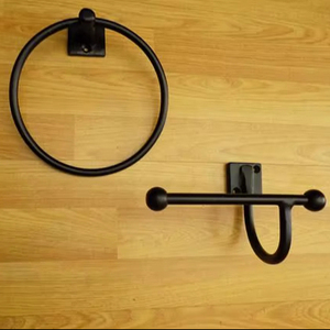 Porte-papier toilette mural en métal avec fixation robuste pour une installation sécurisée dans la salle de bain et une utilisation stable - Product Image 1