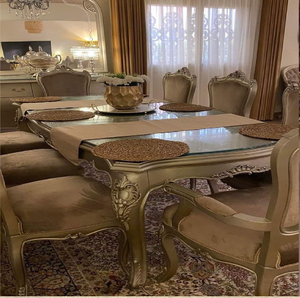 European rectangular glass top dining table with carved wooden <b>legs</b> and fabric chairs, available at wholesale prices. - Product Image 5