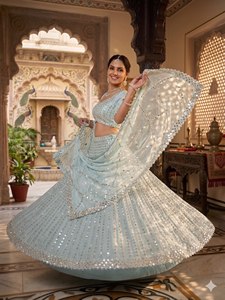 Présentation de la plus belle collection de Lehenga Choli de créateurs, en soie Rangoli de qualité supérieure, ornée de broderies, pour les occasions spéciales. - Product Image 3