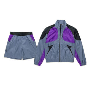 Conjunto cortavientos para hombre enfocado en el rendimiento, que ofrece soporte flexible y de secado rápido para entrenamientos regulares. - Product Image 1