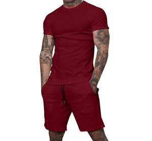 Ensemble décontracté d'été pour homme en coton rouge uni, t-shirt à col rond et short à cordon de serrage, respirant, tricoté, léger, à manches courtes - Product Image 1