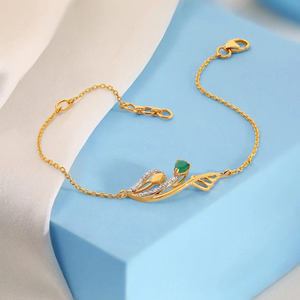 Green Leaf Eye Diamond Bracelet with Yellow Gold Flowing Vine Detail and Sculpted Nature Inspired Center Design - Product Image 6