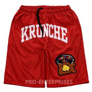 กางเกงขาสั้นวินด์เบรกเกอร์ปักลายสำหรับผู้ชาย โพลีเอสเตอร์ 100% เอวยางยืด ผ้าทอเนื้อแน่น ระบายอากาศได้ดี - Product Image 1