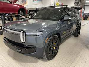 Good deal for R-ivian R1S Launch Edition Inspected ~4,200 Miles, <b>Quad</b>-Motor A W D, Large <b>Battery</b> Pack - Product Image 1