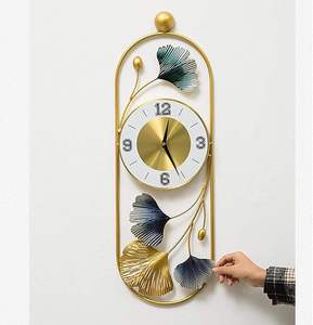 Reloj de Pared Metálico Dorado Sunburst, Reloj Decorativo de Lujo, Elegante y Moderno para Interiores - Product Image 5