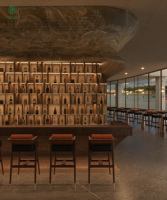 Comptoir de bar intérieur de luxe pour espace lounge en bord de mer, vitrine à vin rétroéclairée, décoration artistique de plafond pour projet de restaurant ou bar
