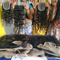 Cheveux humains naturels brésiliens bruts tressés Genius Weft Transparent Lace 4*4 Closure Wavy Temple No Chemical Processing