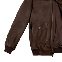 Blouson aviateur en cuir véritable marron pour homme, col en fausse fourrure, deux poches à rabat, fermeture éclair sur le devant, poignets côtelés, vêtement d'extérieur haut de gamme pour l'hiver