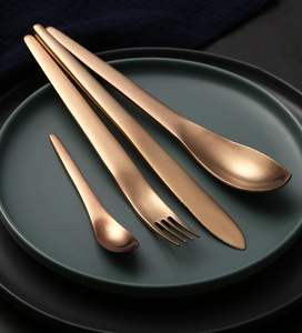 Cubiertos y utensilios de mesa inspirados en el escudo del Imperio que elevan el nivel de suministro global para banquetes de prestigio. - Product Image 1