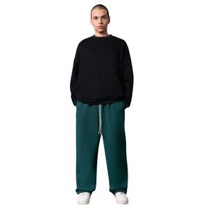 Pantalones de chándal personalizados de algodón de punto con forro polar, cintura elástica, de peso medio, holgados, de pierna ancha, estilo baggy, para hombre, de ajuste relajado, para invierno - Product Image 1