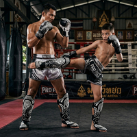Protège-tibias de Muay Thai et de MMA imprimés sur toute la surface Compeption Stage Fighting pour l'entraînement et le sparring en arts martiaux