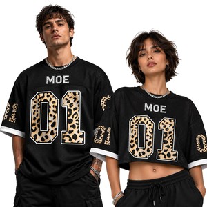 เสื้อเจอร์ซีย์อเมริกันฟุตบอลลายเสือดาวแบบกำหนดเองได้ แต่งขอบตัดกัน ทรงโอเวอร์ไซส์สำหรับทุกเพศ และเสื้อครอปท็อปผ้าตาข่ายสีดำ - Product Image 1