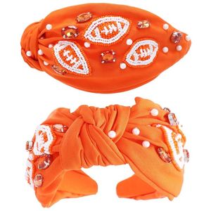 Bandeau blanc en tissu style baseball avec nœud et logo en strass noir, accessoire de cheveux sportif et décontracté - Product Image 6