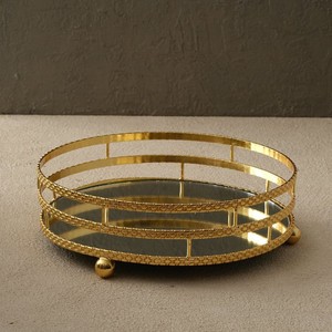 Plateau ovale en laiton artisanal avec finition polie et base miroir, idéal pour la présentation de luxe à la maison, à l'hôtel ou sur table. - Product Image 1